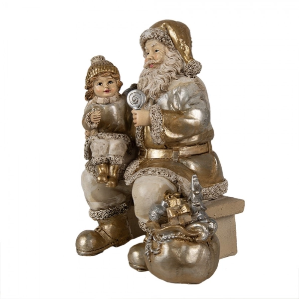 Santa Clause s dietaťkom a darčekmi 